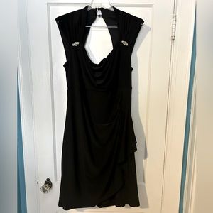 Flattering black cocktail dress with rhinestone accents